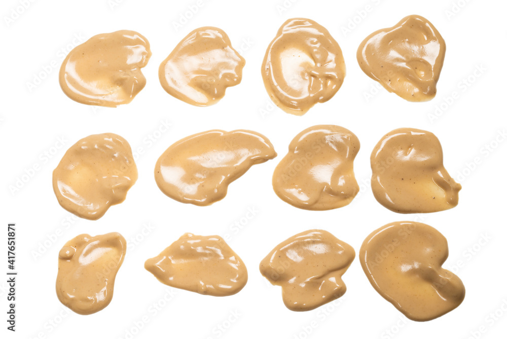 Mushroom sauce splashes isolated on white background. Mushroom sauce splashes isolated on white background.