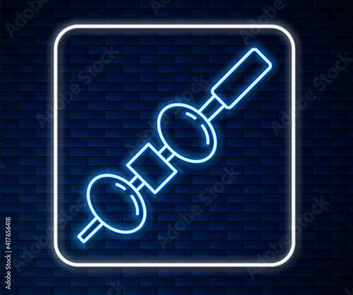 Glowing neon line Olive and cheese on chopstick icon isolated on brick wall background. Canape, tapas with cheese and olive. Vector.