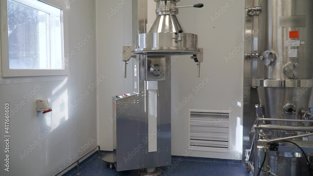 Pharmaceutical production line. Manufacture of tablets. The process of stirring extract. Supply conveyor device. Industry line of medical products Pharmaceutical production line. Manufacture of tablets. The process of stirring extract. Supply conveyor device. Industry line of medical products