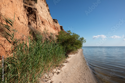 Shore with clay mountains, rocks and hills near the Dnieper estuary and Black Sea. Stanislav, Grand Canyon of Kherson region, Ukraine.