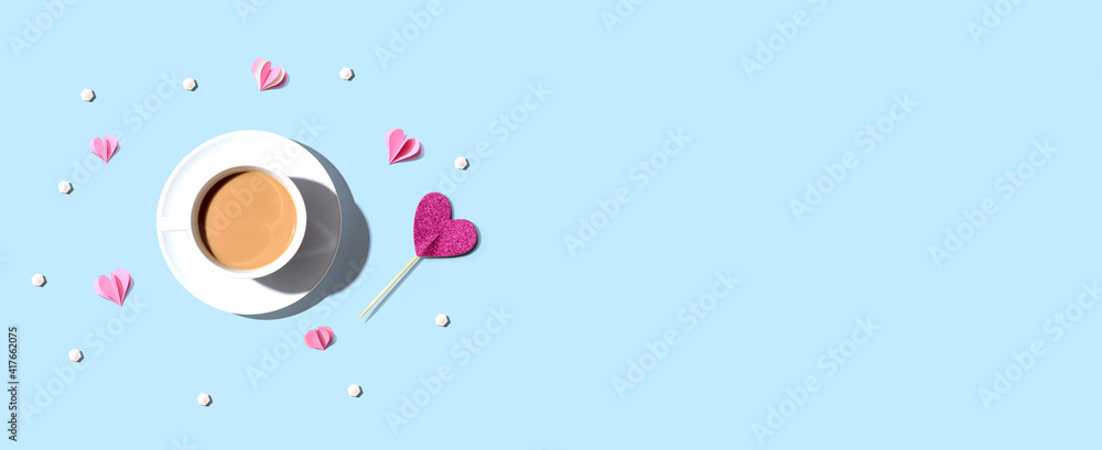 A cup of coffee with paper hearts - flat lay A cup of coffee with paper hearts - flat lay