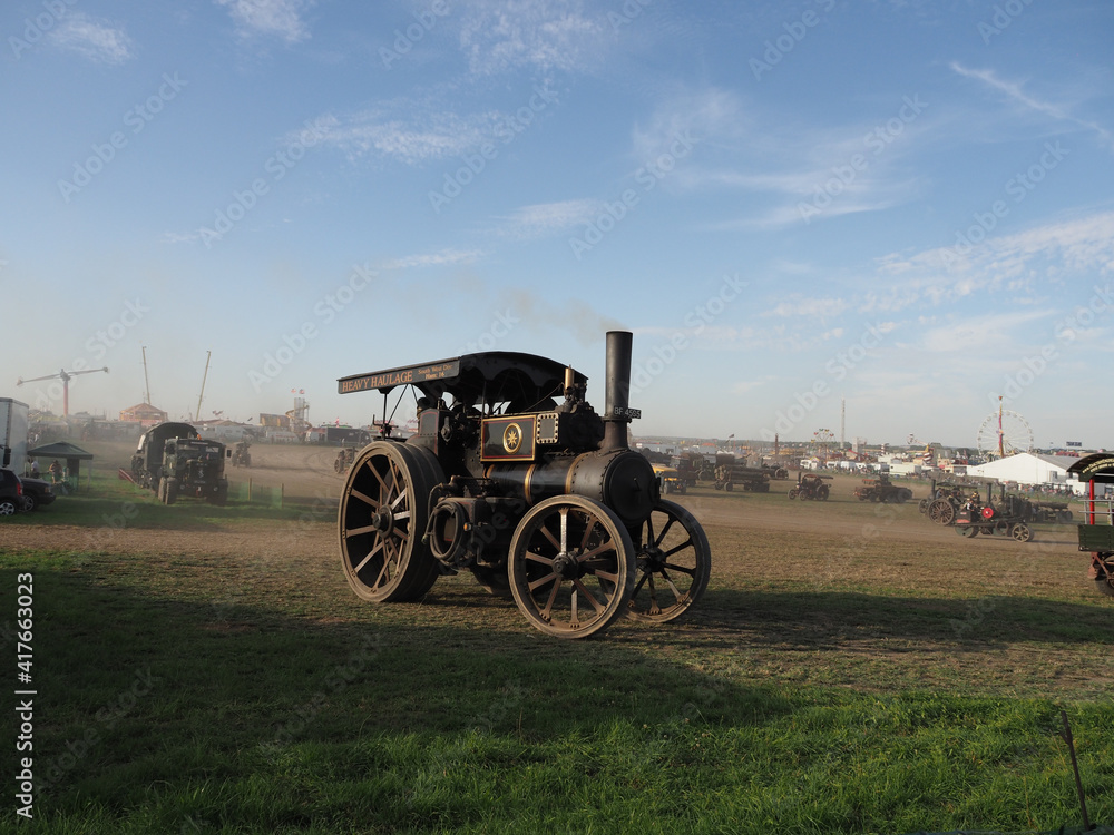 Fototapeta premium a vintage road haulage traction engine at work on the display ground of a steam fair
