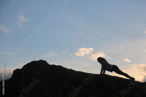 woman push upsin the mountain outdoors © fotoXS