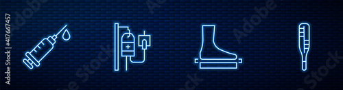 Set line Flat foot, Syringe, IV bag and Medical thermometer. Glowing neon icon on brick wall. Vector.
