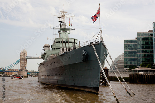 portrait of HMS Belfast moored on the River Thames in London 