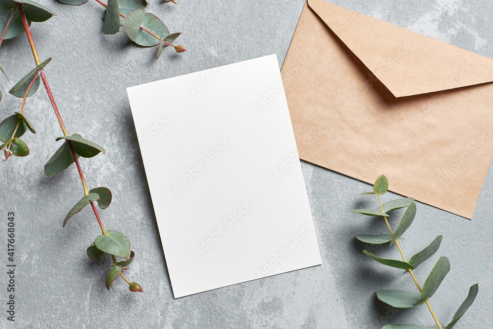 Wedding invitation card mockup with envelope and eucalyptus branches on ...