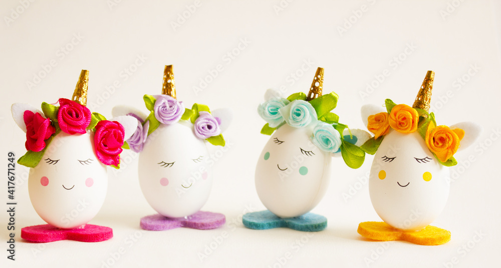 Easter concept. Unicorn easter eggs on a white background. Background for design. Festive background. Easter concept. Unicorn easter eggs on a white background. Background for design. Festive background.