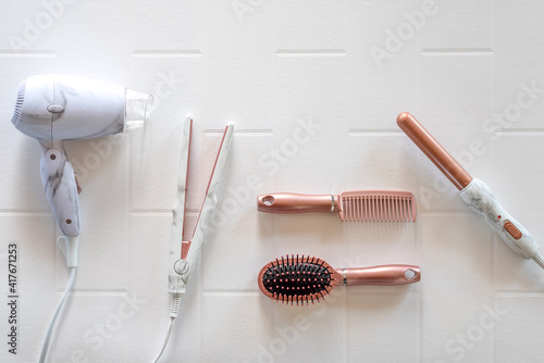 Принти на полотні Beautiful hair styling tools on a white background