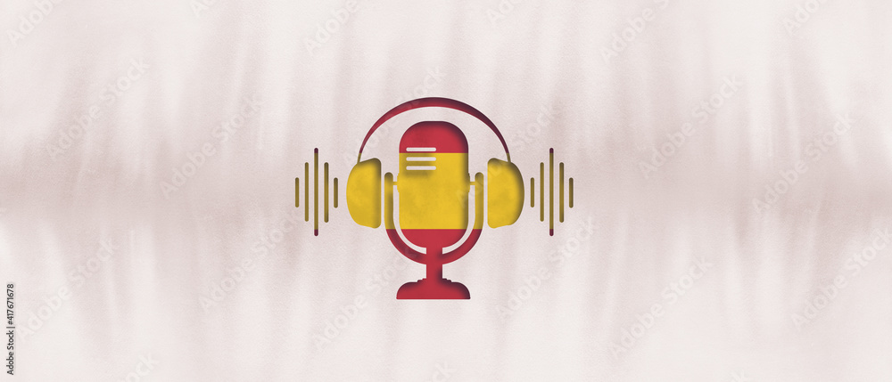 Fototapeta premium podcasting concept. Icon of a radio microphone with headphones. broadcasting banner. Spanish flag. Language course. culture and society.