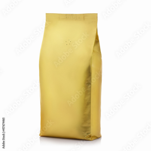 Foil paper food bag package of coffee, on white background Isolated. Mock up template for design. Product packing photo