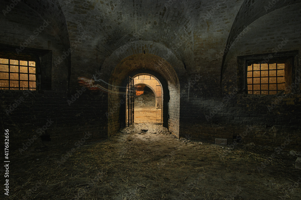 Dark interior of the old abandoned empty underground casemate flank of the Kyiv fortress of the 18th-19th centuries.