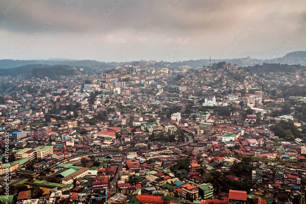 Fototapeta premium dramatic summer sunrise in Mines View Park in the Summer Capital of the Philippines , Baguio City.