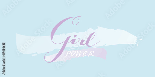 violet lettering girl power. Blue spring background 