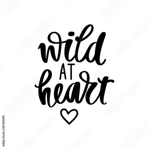 Wild heart - Vector hand drawn lettering phrase. Modern brush calligraphy. Motivation and inspiration quote
