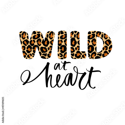Wild heart - Vector hand drawn leopard lettering phrase. Modern brush calligraphy. Motivation and inspiration quote