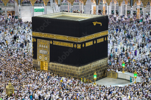Holy Kaaba. Muslim pilgrims from all over the world. A crowd of pilgrims circumambulate - tawaf