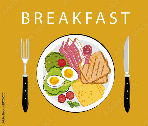 Classic hearty breakfast. Nicely served food on a plate with a fork and knife. Boiled eggs, fresh lettuce, cilantro, bacon, cherry tomatoes, slices of cheese, toast. An energizing family meal.