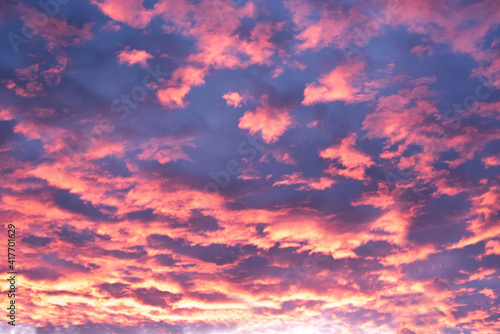 red sky background with clouds