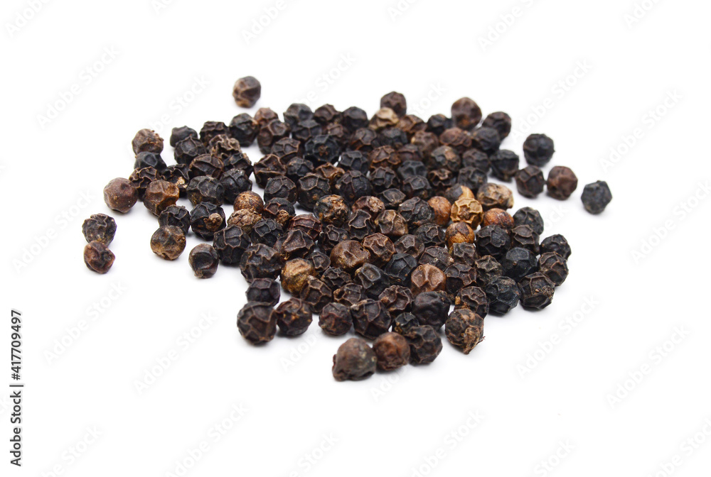 Red and black peppercorns, isolated on white background Red and black peppercorns, isolated on white background