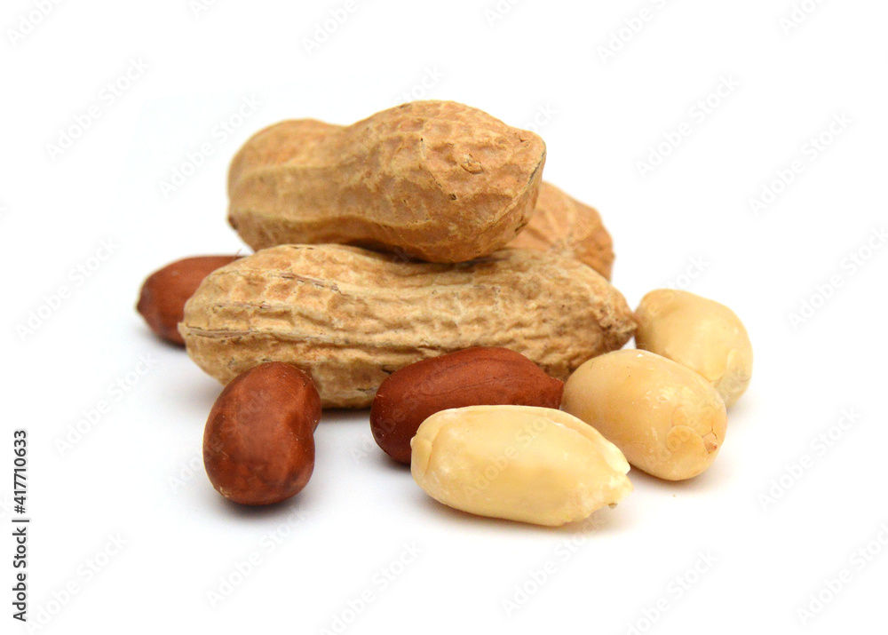 Composition from nuts on the white isolated background Composition from nuts on the white isolated background