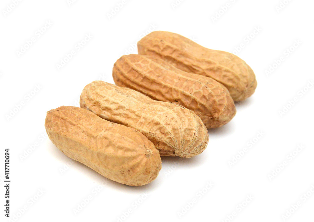 Composition from nuts on the white isolated background Composition from nuts on the white isolated background