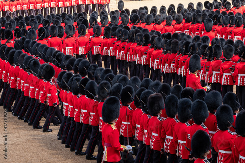 Photographie Trooping the Colour, military ceremony at Horse Guards Parade, Westminster with the Coldstream Guards in their red and black traditional uniform and bearskin hats