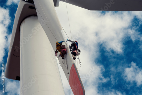 Bulgaria, Kaliakra, SEPTEMBER 3th, 2020: Two people repairing wind turbine