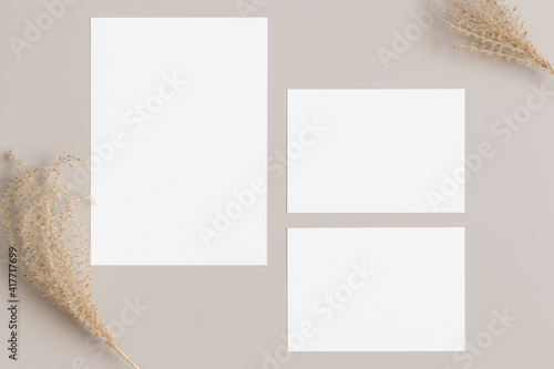 Wedding invitation stationery mockup with a dried grass decoration. Dimensions: 5x7", 3.5x5".