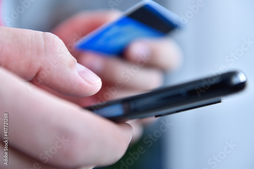 Businessman paying with credit card online