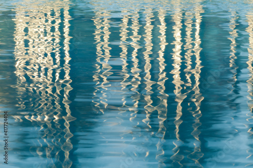 USA, California, San Diego. Reflections on Children's Park pool in Martin Luther King Jr. Promenade.