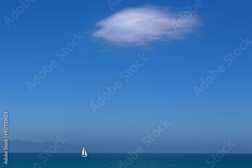 Lonely sail in the sea, Sardinia, Italy 