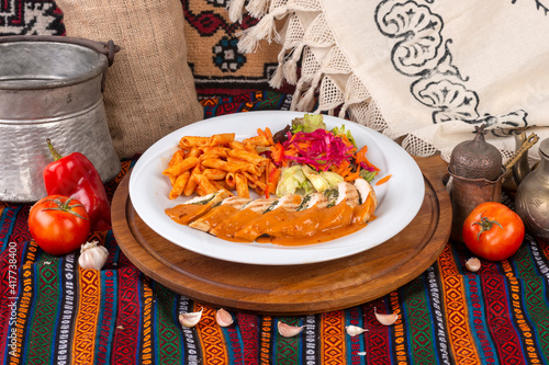 Ready-to-serve meals cooked on a white plate photo