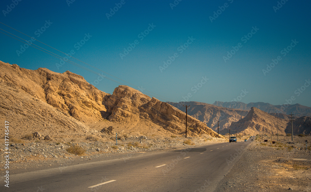Beautiful road scenery of blue clear sky in the jebel jais mountain 
