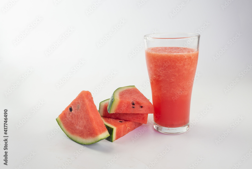 Watermelon smoothie with watermelon slices on white background Watermelon smoothie with watermelon slices on white background