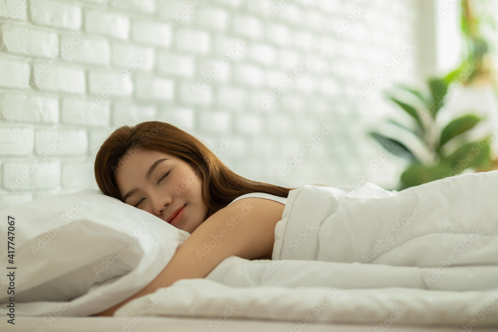 Beautiful Attractive Asian woman sleep and sweet dream on bed in bedroom in the morning feeling so relax and comfortable,Healthcare Concept Beautiful Attractive Asian woman sleep and sweet dream on bed in bedroom in the morning feeling so relax and comfortable,Healthcare Concept