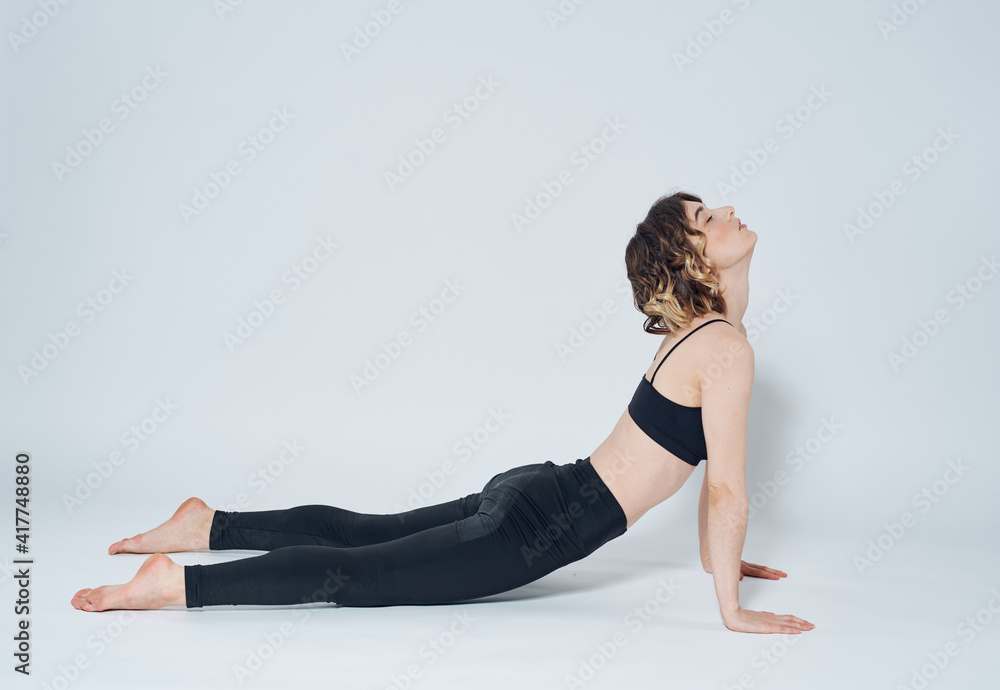 Women doing push-ups In a light room, sports meditation yoga asanas