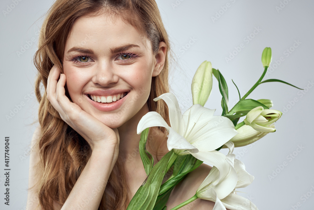 girl with flowers cropped view portrait close-up spring bare shoulders clear skin Make Up girl with flowers cropped view portrait close-up spring bare shoulders clear skin Make Up