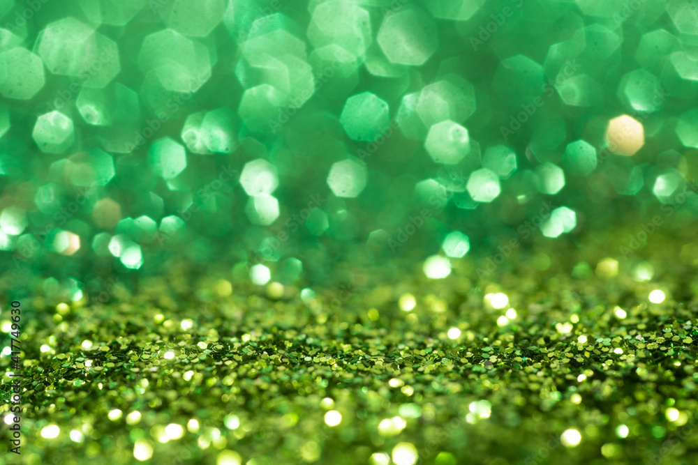 Obraz premium Green spring background. Colorful sparkles. Abstract advertising.