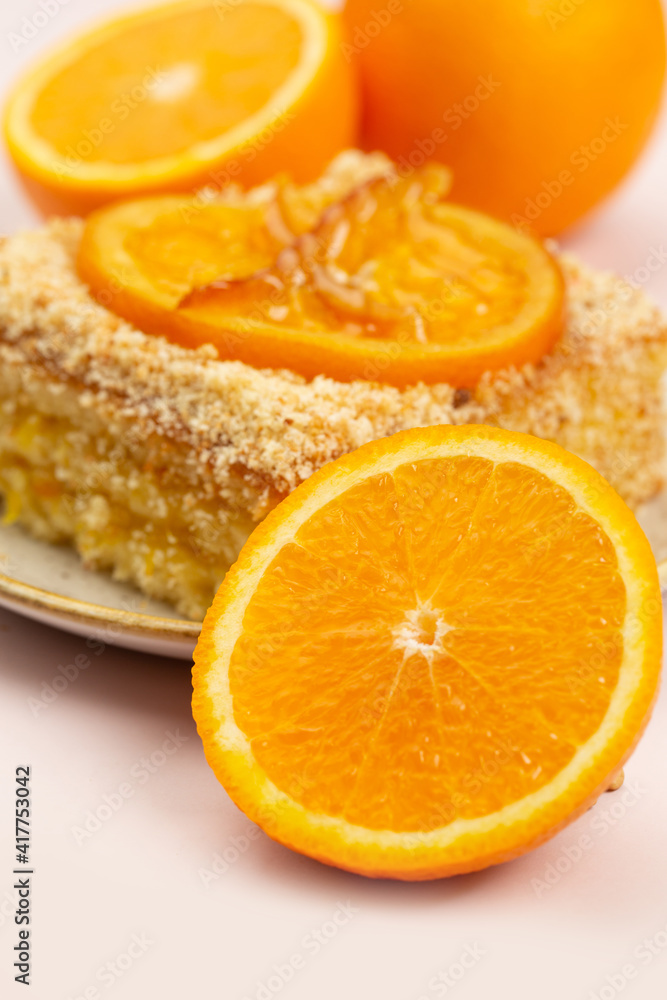Piece go cake with orange cream and orange fruit Piece go cake with orange cream and orange fruit