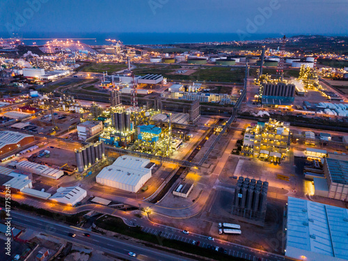 Industrial background with modern large chemical factory at night, Salou, Spain