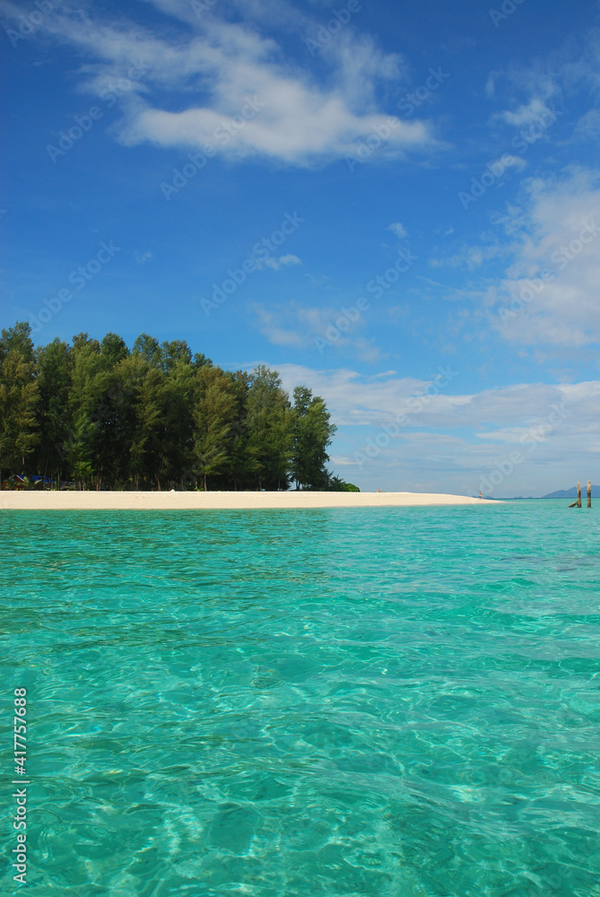 Beautiful blue ocean seascape at Lipe Island in Satun Province, Thailand. Tourists can enjoy , transparent water, corals, marine lives, holiday in summer in Southeast Asia. Wonderful sightseeing