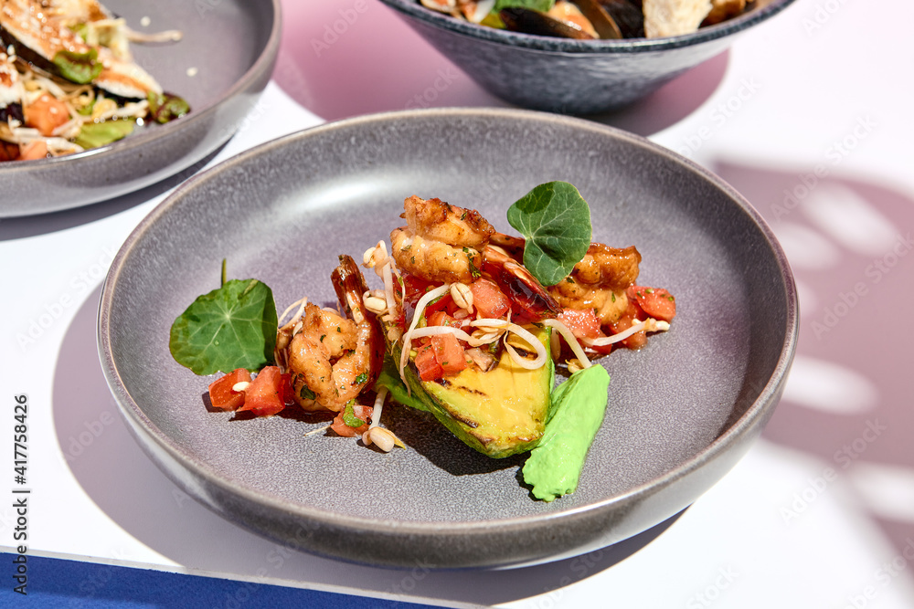 Shrimp and Avocado Grill restaurant plate. Restaurant appetizer food