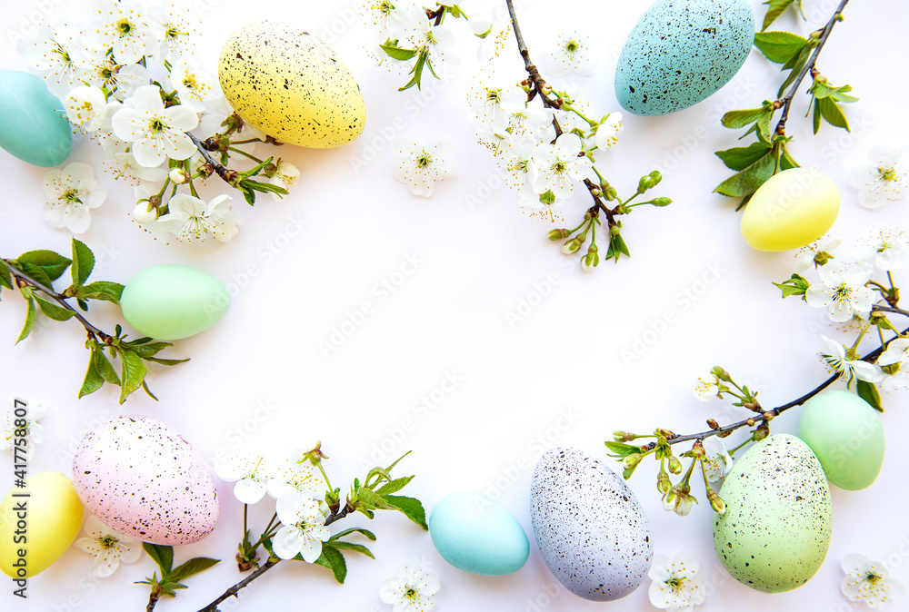Colorful Easter eggs with spring blossom flowers Colorful Easter eggs with spring blossom flowers