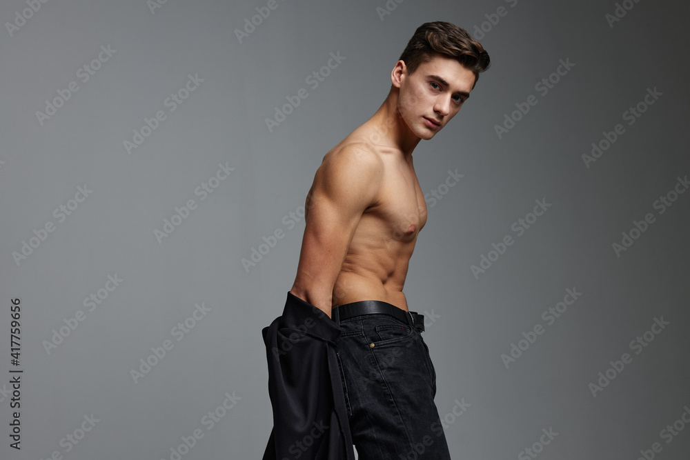 Male topless black shirt cropped view attractiveness fashion lifestyle Male topless black shirt cropped view attractiveness fashion lifestyle
