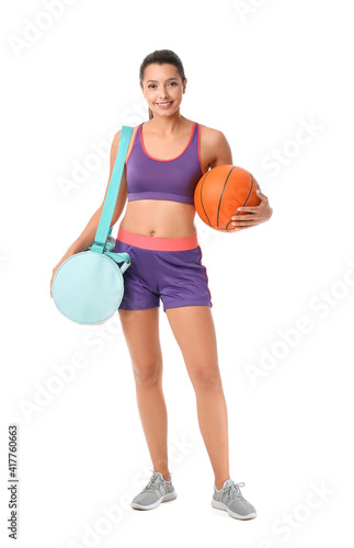 Young woman with sports bag...