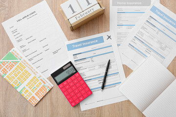 Calculator and documents for travel on table