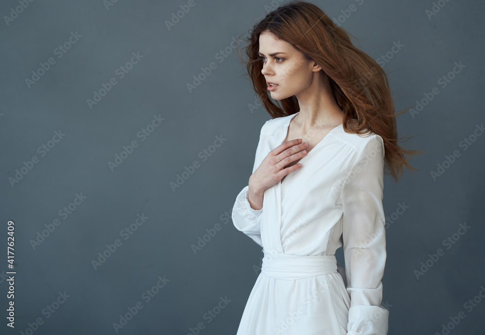 Woman in white dress attractive look luxury model gray background Woman in white dress attractive look luxury model gray background