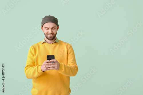 Handsome man with mobile ph...