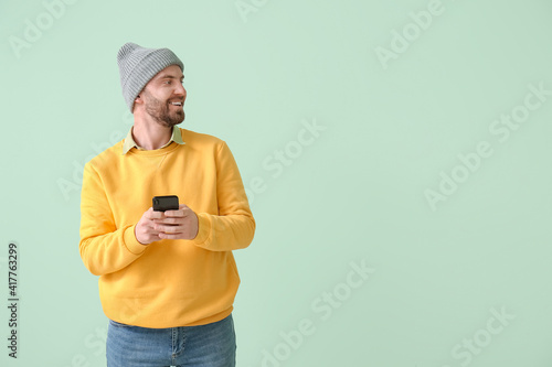 Handsome man with mobile ph...