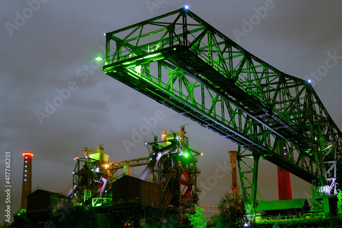 Night shot of Landschaftspark Nord, old illuminated industrial ruins in Duisburg, Germany